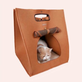 Niche chat en forme de sac à main marron, tendance et confortable avec un chat à l'intérieur