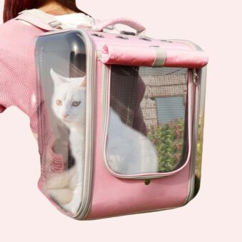 Sac à dos de transport respirant pour chat rose porté par une femme avec un chat à l'intérieur