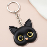 Porte-clés avec yeux et oreilles de chat noir