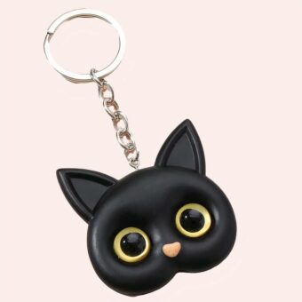Porte-clés avec yeux et oreilles de chat noir
