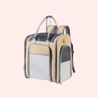 Sac à dos extensible pour chat de couleur jaune, sur fond rosé